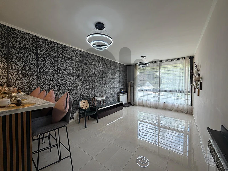Semi-Furnished Apartment with Terrace for Rent in El Douarشقة شبه