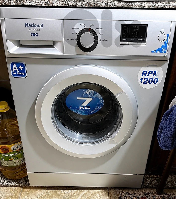silver washing machine with one month warranty