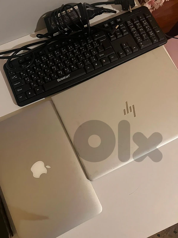 HP book & MacBook Air laptops