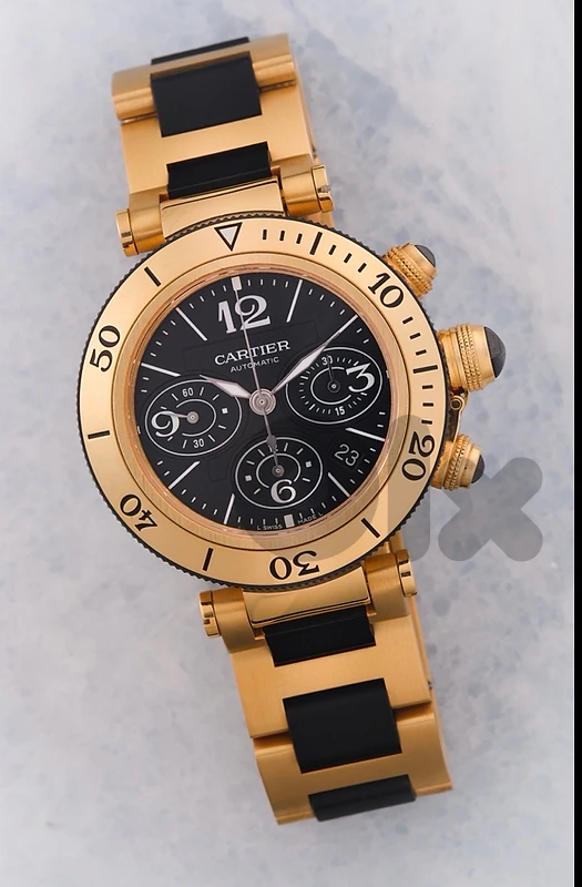Cartier Pasha Seatimer Chronograph, recognizable by its 18kt yellow