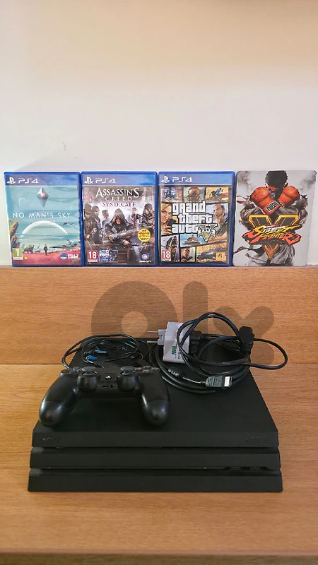 PS4 Pro 1TB barely used + original controller + 4 original games