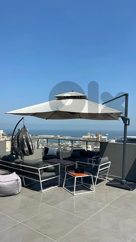 Outdoor umbrella - شمسية خارجية