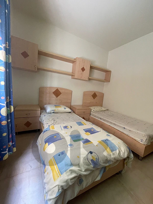 Two beds with there nightstand