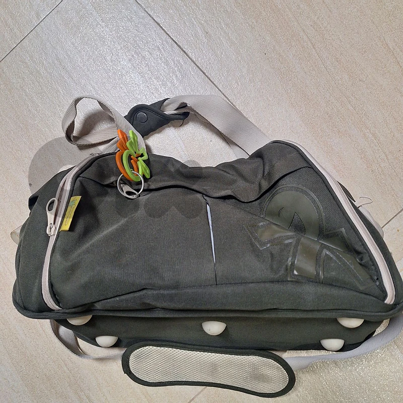 babies diaper and clothes hand bag