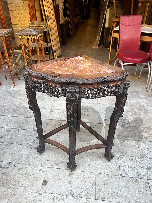 CHINESE CARVED HARDWOOD CORNER TABLE WITH INSET ROUGE MARBLE TOP Late