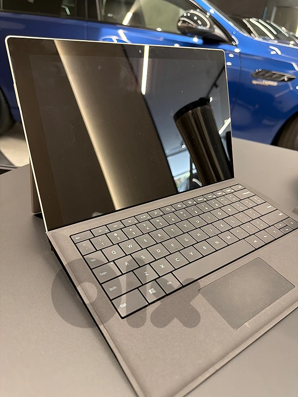 microsoft surface pro 3 with keyboard and charger