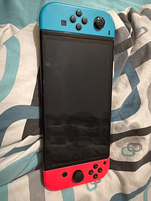 nintendo switch  OLED pristine condition WITH 3 games