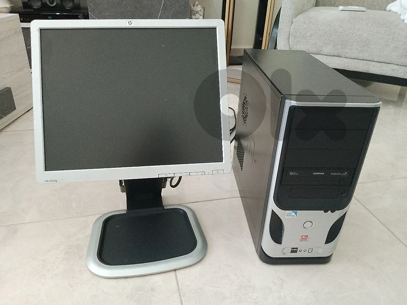 Desktop PC (Tower) paired with an HP L1950g LCD Monitor.