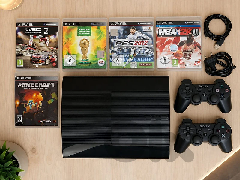 PS3 Slim console with games and 2 controllers and all cables included