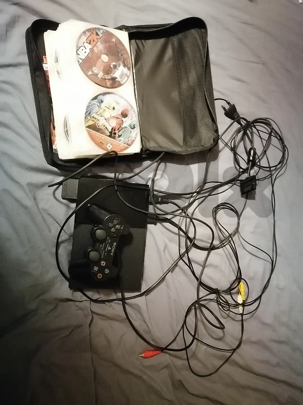 Playstation 2 with more than 60 games