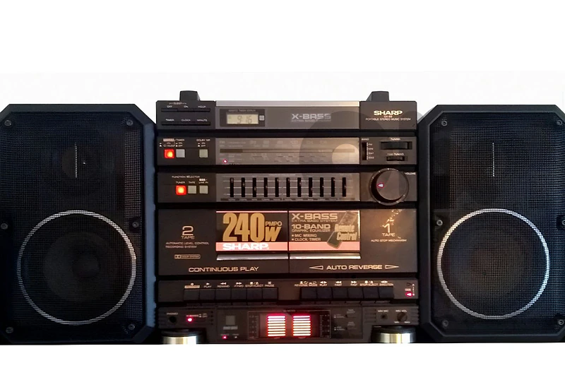 Vintage XBass BoomBox with original
remote control / Since 1980  ستريو