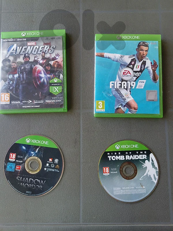xbox one with keyboard and mouse and 4 cds with two controllers