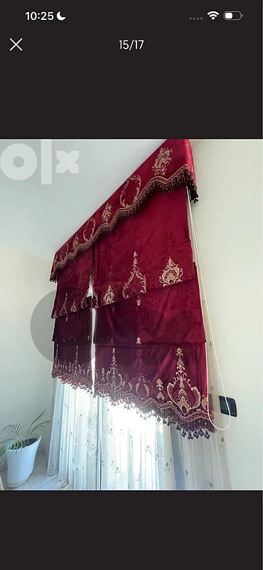 red velvet curtains ( and under them a beige curtains )