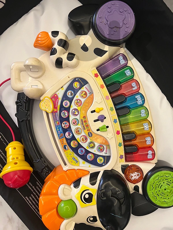 a piano with microphone with music for babies