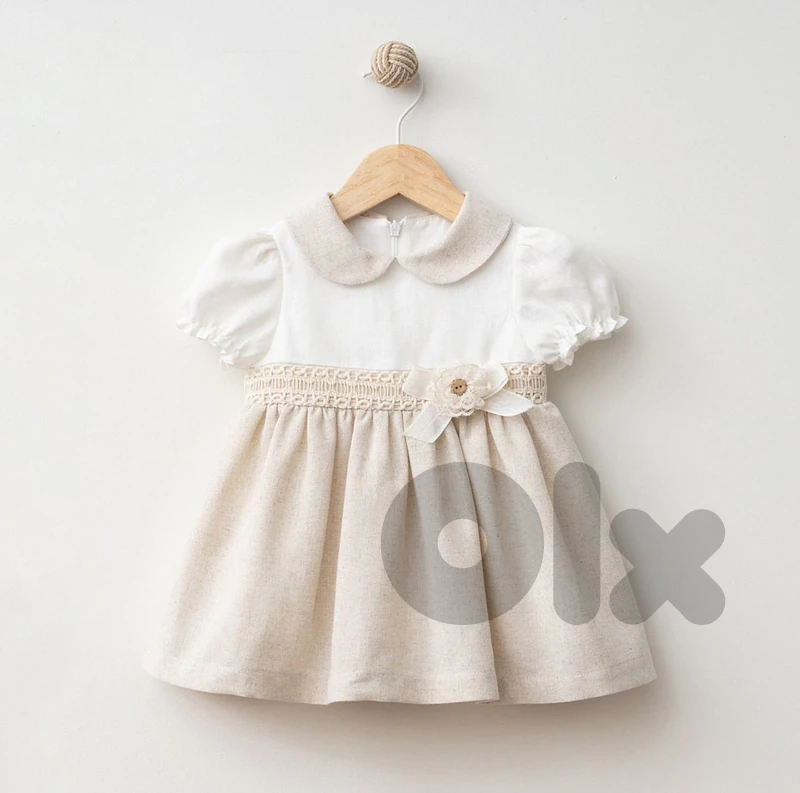 متجر ألبسة أطفال – stock of children's clothing for sale.