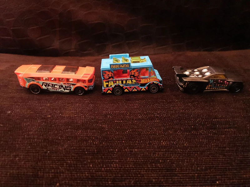 three cars a music call a boss and a fuego fajItas truck