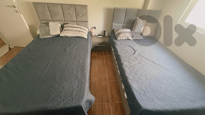 2 beds & 2 matress + side table