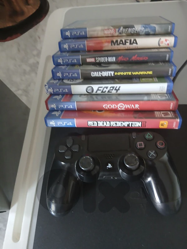 ps4 slim with 1 original controller and 7 games