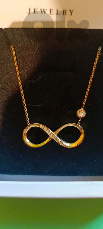 Gold-plated infinity necklace سعره بالسوق ٧٠ دولار