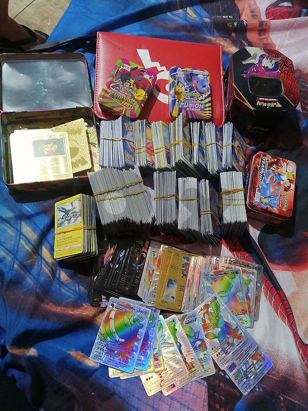 Pokemom cards/boxes and album