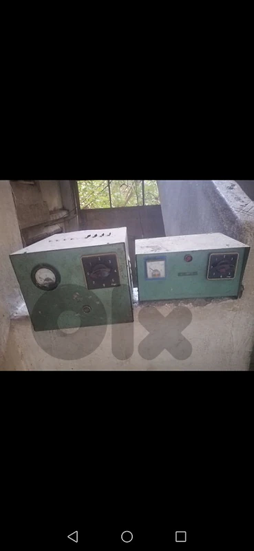 Two vintage electrical control boxes.