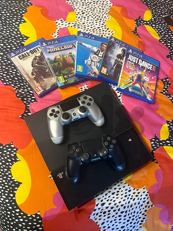PS4 with 2 consoles and games
