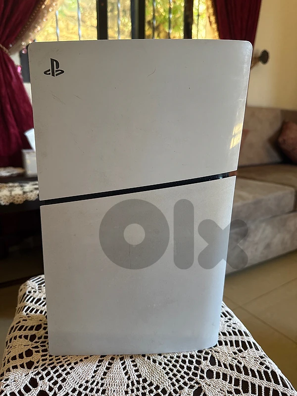 PS5 1TB + 2 Original Controllers + FIFA 25 – Excellent Condition