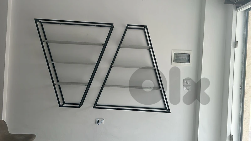 11 Stands and A Bar table