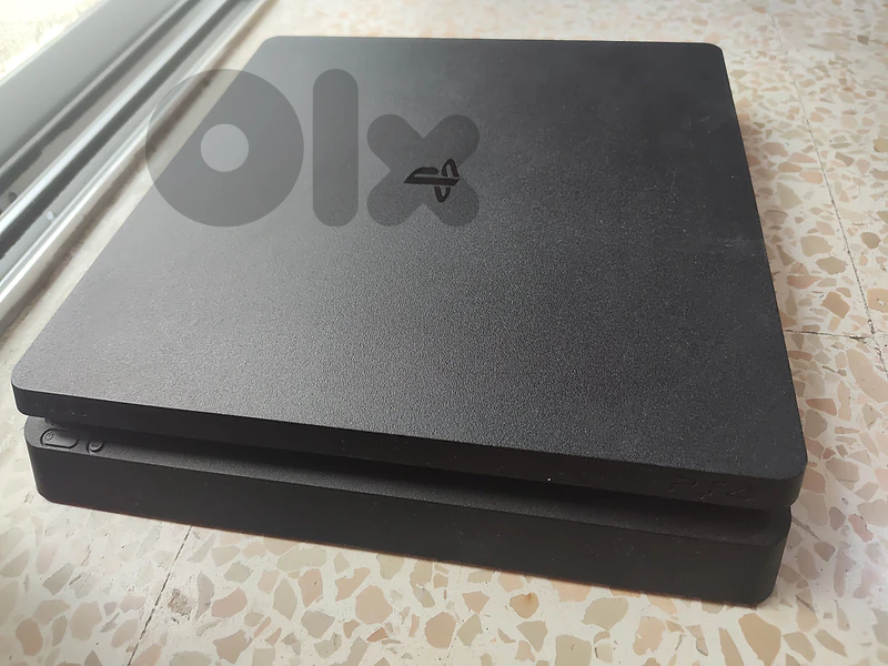 PS4 Slim with 2 Controllers with 13 Games