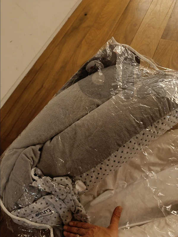 Baby carrier and nursing pillow