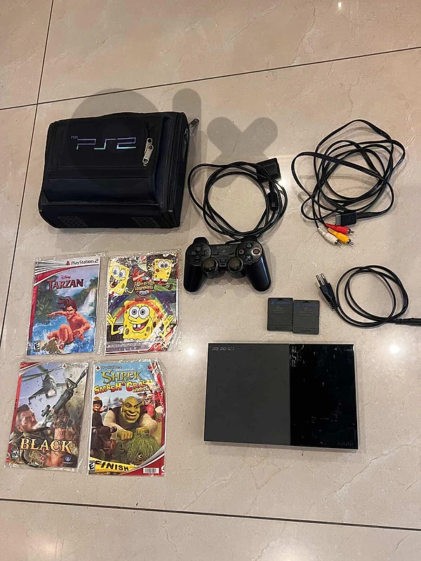 PS2 console + accessories + games