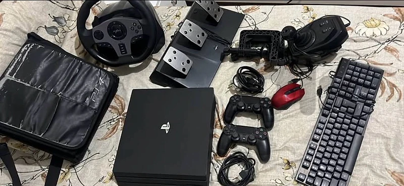ps4 pro 1tb with steering wheel