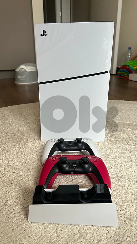 PS5 Slim Disc edition with 2 controllers and wireless charger and