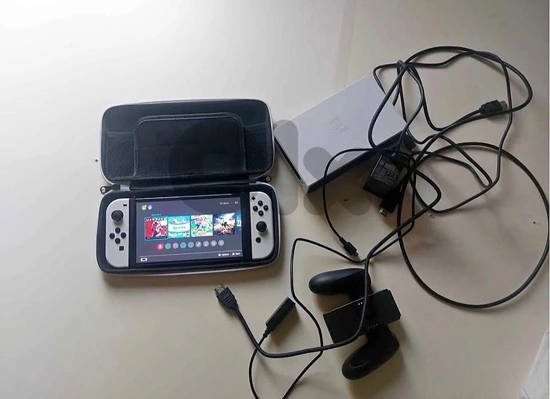 nintendo switch oled perfect condition 5 disks and a bag nintendo switch oled perfect condition 5 disks and a bag