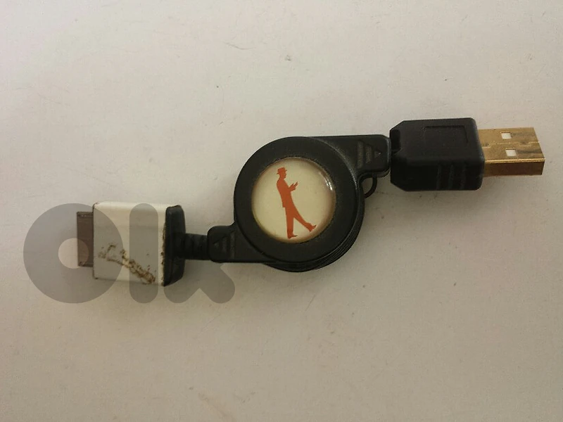 Old flexible retractable cable charger (for Sony) - Not Negotiable