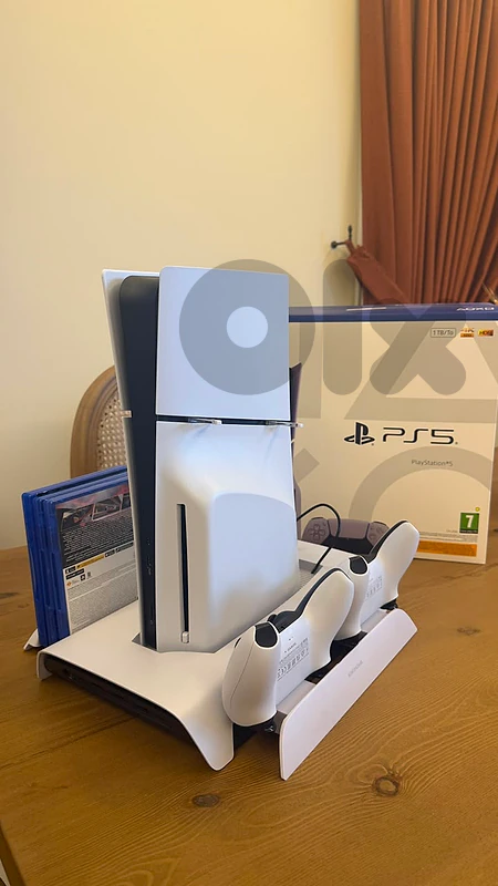 PS5 Slim 1TB Disc + 2 Controllers + 4 Games + Cooling Stand