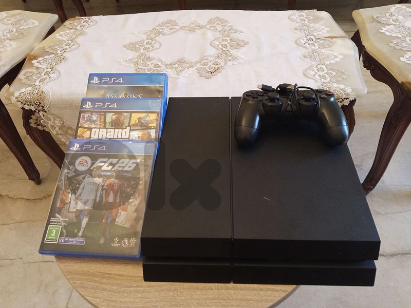 PS4 fat 1 TB Bundle with fc26, GTA 5, and assassin's Creed origins