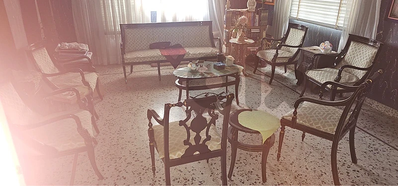 Chairs, tables and small closet