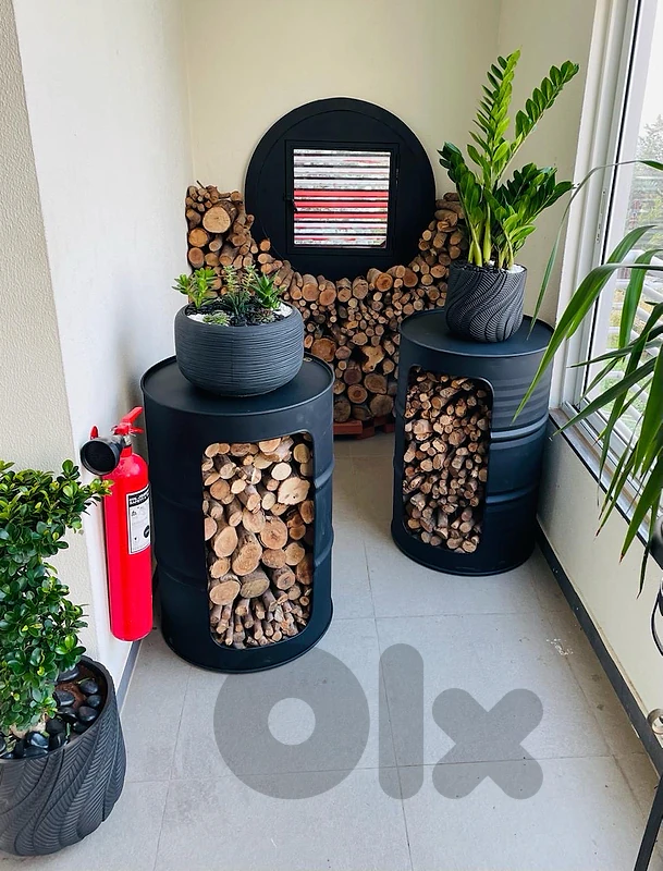 Powder coated barrels for wood logs.