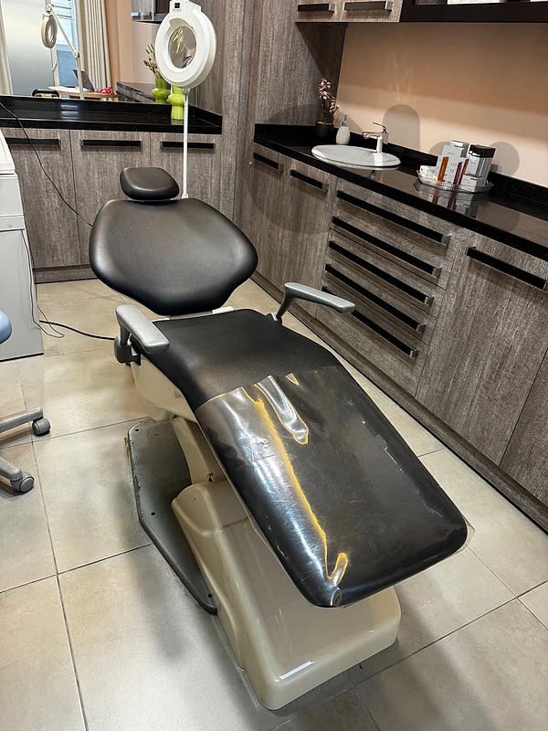 Professional adjustable treatment chair for sale.