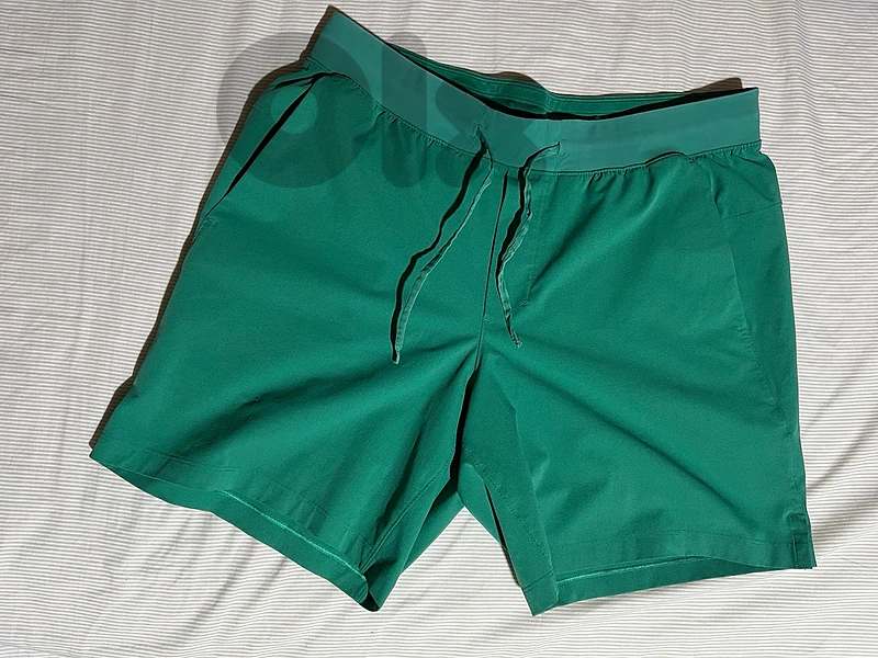 Green Lululemon gym shorts for men