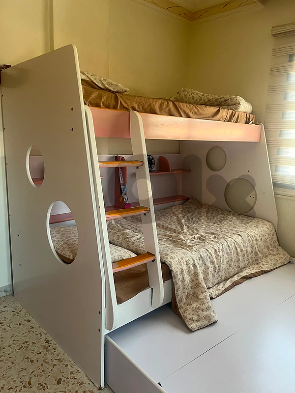 bedroom 3 beds with 2 closets