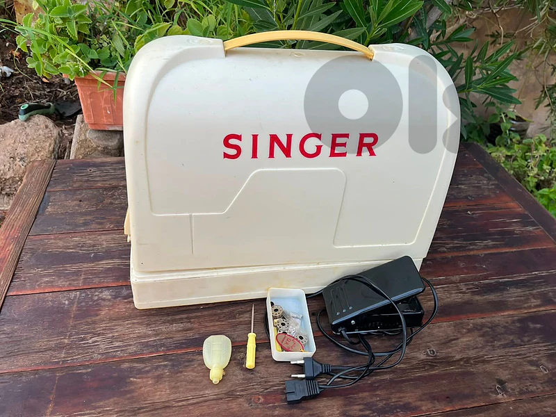 Singer Sewing Machine-New