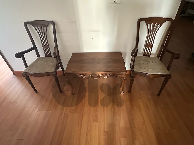 wooden side table with 2 srmchairs