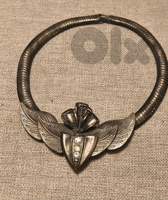 Vintage silver-tone neck ornament