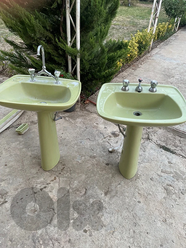 2 Green Sinks With Mixers