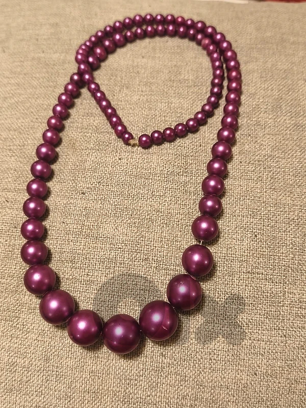 Purple multi-strand bead necklace