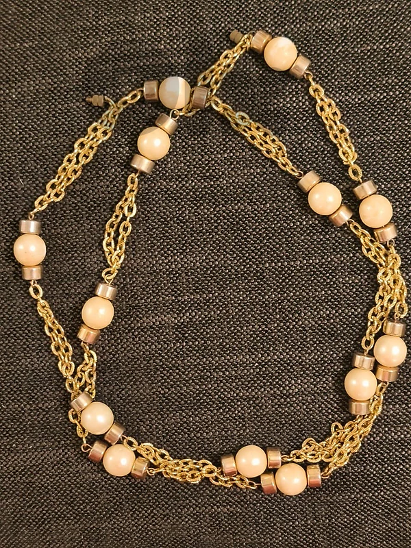 Gold-tone chain necklace with cream beads