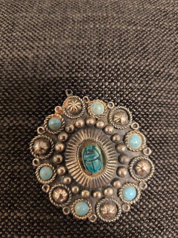 Large turquoise and silver-tone brooch