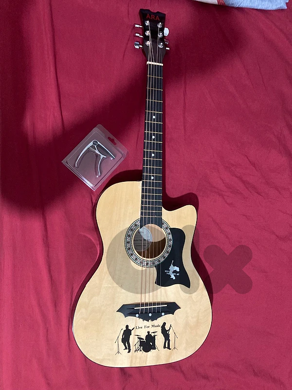 ara acoustik guitar barely used strings + capo